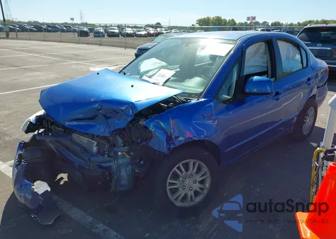 2012 Suzuki Sx4 Le/Le Popular z USA, uszkodzony, nr VIN JS2YC5A34C6305394